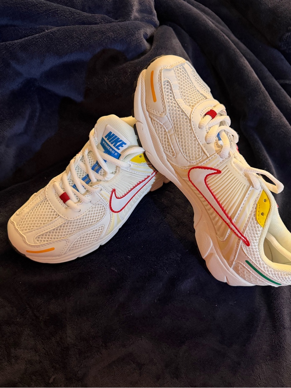 Nike White Sneakers with Red Swoosh and Multicolor Accents